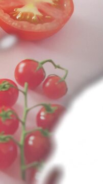 Vertical video: Film sweeping right showing blue icons and obscuring tomatoes, making highlights