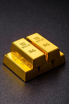 Gold bars or ingots as a metal for bank storage, investments, and financial transactions. Gold bars