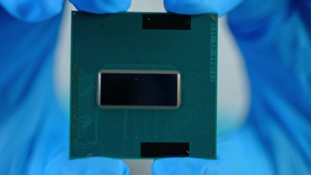 Display of CPU chip as result of engineering design and use of mining of rear earth materials. Rare earth elements, REE play critical role in CPU GPU RAM and SSD production for AI data centers.