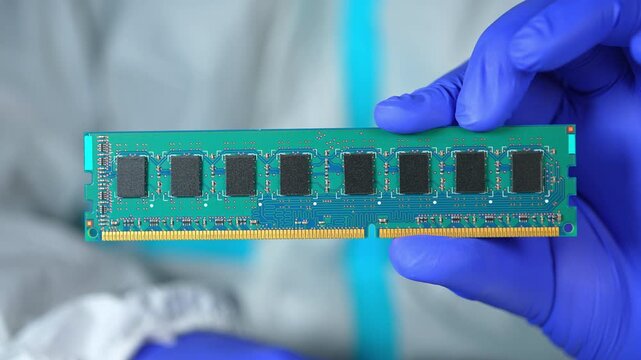 RAM stick with DRAM, Dynamic Random Access Memory chips. Core storage components holds data temporarily for quick CPU access. Storage of binary information using billions of capacitors and transistors