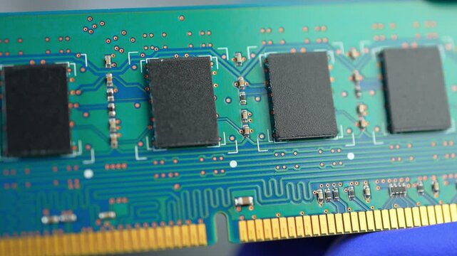 RAM stick with DRAM, Dynamic Random Access Memory chips. Core storage components holds data temporarily for quick CPU access. Storage of binary information using billions of capacitors and transistors