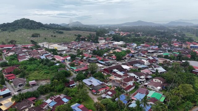 Aerial drone view of Kubang Semang town and surrounding hills