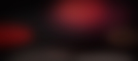 Fototapeta premium Dark abstract background, with grainy texture, featuring soft blurred, red and maroon, light orbs against, a deep black, shadowy atmosphere