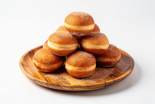 Malasadas Doughnuts on Bamboo Plate 30 Degree Angle Isolated on White Background Studio Shot