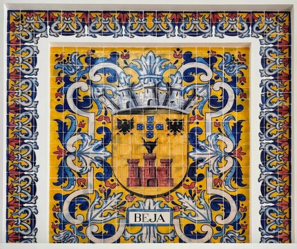 Photo of the municipal coat of arms of Beja, depicted in traditional polychrome Azulejo tiles inside the historic Sul e Sueste river terminal. 
