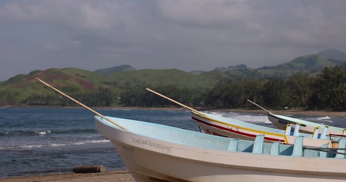 Boats line the shore of Roca Partida Beach in Arroyo de Liza, Veracruz, Mexico.