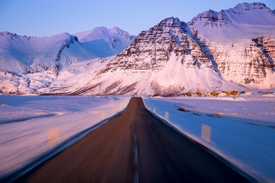 Car point of View of a car driving along a mountain road towards the mountains at speed, Iceland
