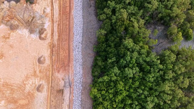 Aerial drone view of land clearing and mangrove at Batu Kawan