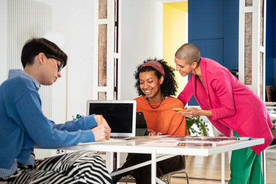 Creative women collaborating in a modern office space