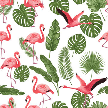 Vibrant pink flamingos and lush green tropical leaves in a seamless pattern