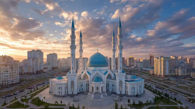 Nur Gasyr Mosque timelapse in Aktobe City unfolds. Cloudy blue sky creates a calm sunset backdrop in Kazakhstan's spiritual center.