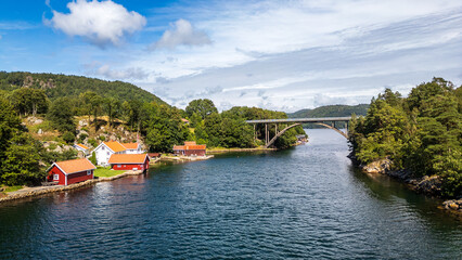 Fototapeta premium Skodje Bridge with Traditional Red Houses, Norway