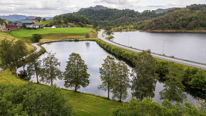 Fototapeta premium Norwegian Landscape: Road Between Lakes in Eidsdal
