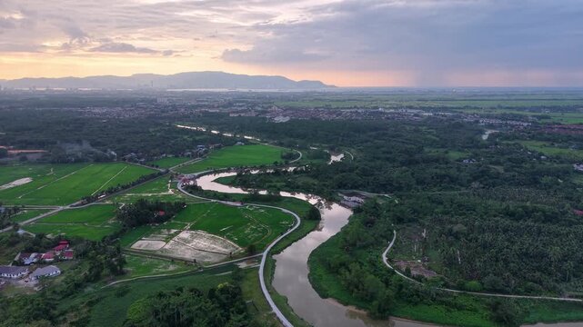 Labuh Banting River Meandering Past Paddy Fields Drone Scenery
