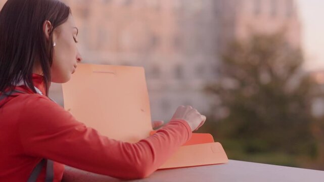 Hopeful university student contemplating her future at sunset