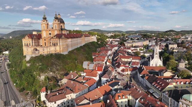 Drone aerial of Stift Melk abbey above Danube river in Wachau Valley Austria.