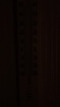 Detailed capture of blue laboratory thermometer with calibration markings
