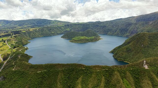 Cinematic Aerial View of Laguna Cuicocha with Cotacachi Volcano in Ecuador