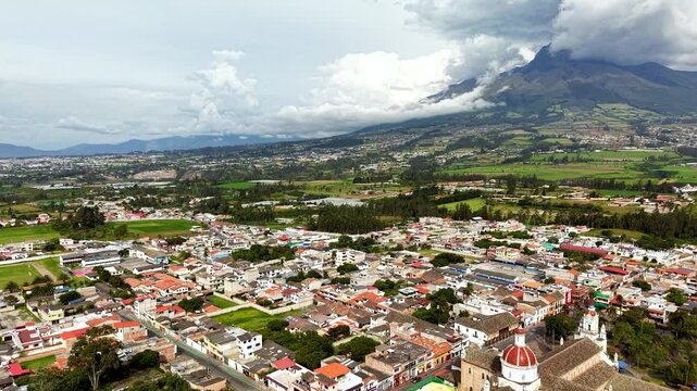 Cinematic Aerial View of Cotacachi with Central Cathedral and Andean Landscape