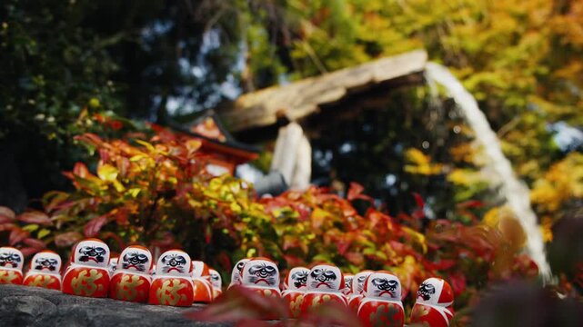 Numerous daruma dolls at katsuoji temple in autumn