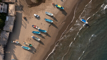 Boats line the shore of Roca Partida Beach in Arroyo de Liza, Veracruz, Mexico.