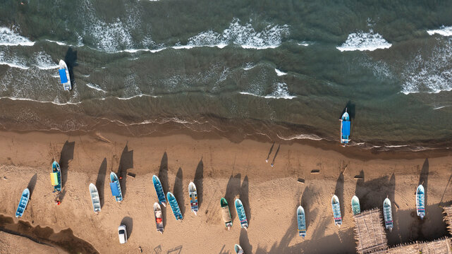 Boats line the shore of Roca Partida Beach in Arroyo de Liza, Veracruz, Mexico.