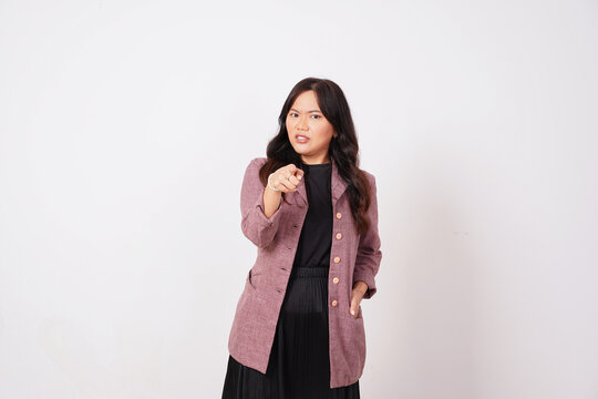 Serious Woman Pointing Finger to Front