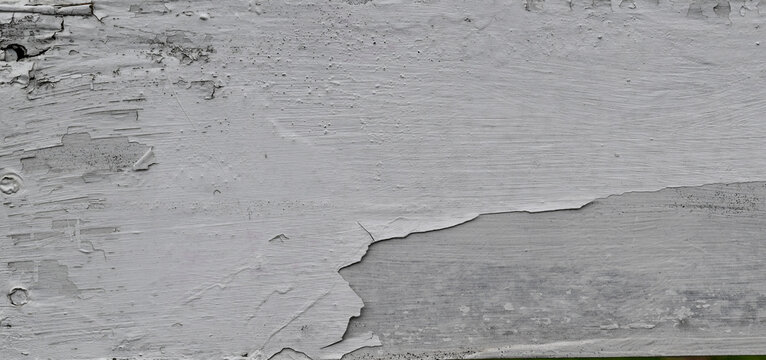 White paint detail on a wooden fence