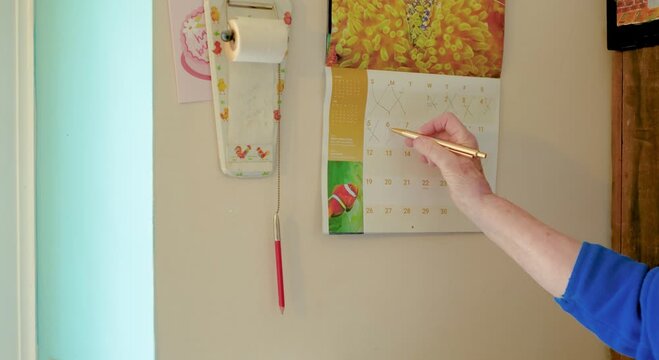 Senior crossing out day on calendar