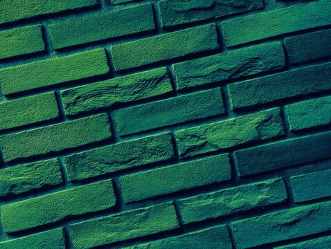Vibrant Green Brick Wall with Textured Surface and Diagonal Pattern: An Abstract Background