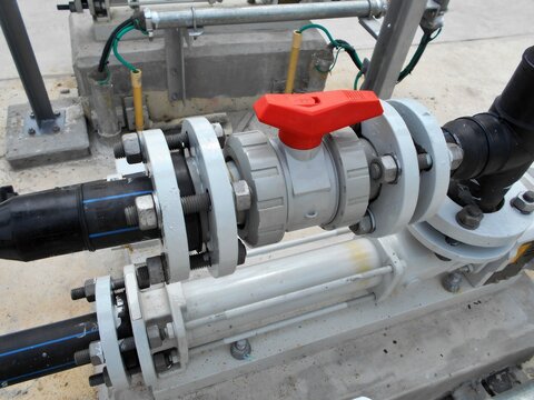 Plastic Ball Valve With Red Handle On HDPE Flanged Pipe Connection