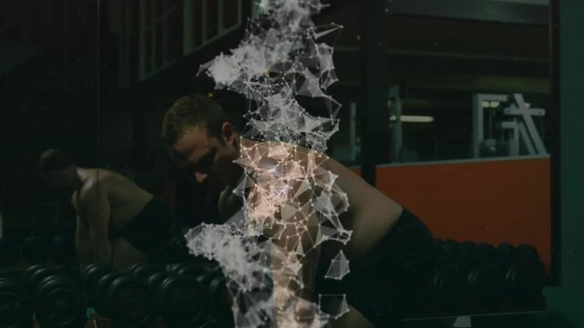Man grabbing weight and doing bent-over rows in gym particle mesh deepening over torso for strength