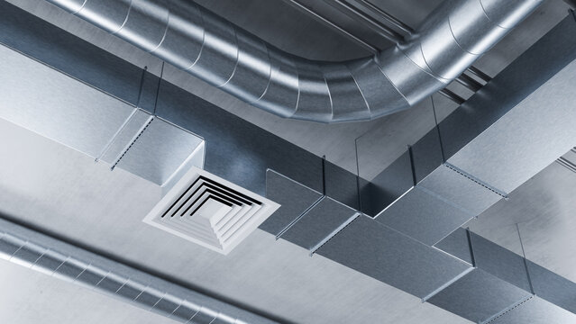 Modern HVAC ventilation system with metal air ducts and ceiling diffuser. Industrial air conditioning, climate control and ventilation infrastructure in building interior,