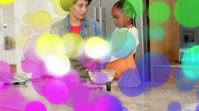 Adult woman placing cup, guiding child pouring into mixing bowl, circle overlaying hands, baking