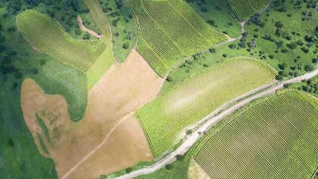 Stunning aerial time-lapse of Xinjiang's grassland, river, snow mountain, waterfall, cloud sea, and highway, showcasing breathtaking natural beauty.