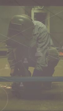 Vertical video: Welder kneeling grinding rail, sparking on hit, smoothing for fit with icons over