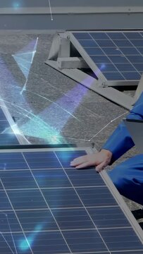 Vertical video: Cam panning, PV tech kneeling checking panels, touching and logging on tab via HUD