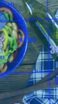 Vertical video: Camera pulling back and revealing blue bowl while HUD scanning salad for nutrition