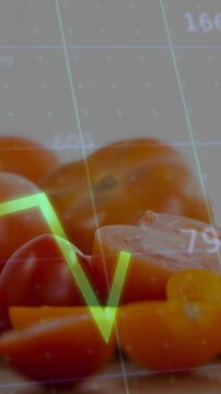 Vertical video: Tomato lying on mat, at 3s green graph rising, orange line staying flat for market