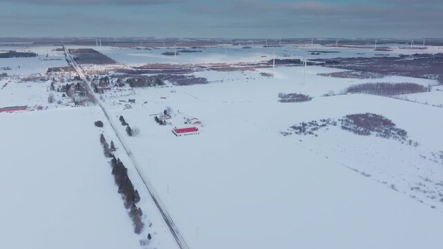 Winter aerial view of wind turbines in snowy Shelburne, Ontario