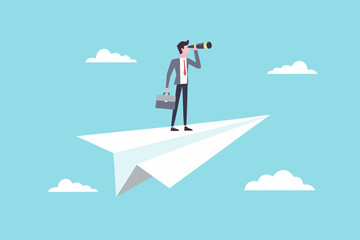 Obraz premium A businessman gazes through binoculars while standing on a paper airplane