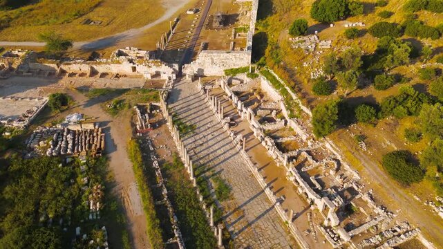 Gelemis, Turkey. Colonnaded Street and Agora as cultural heritage of Patara ancient city, Lycian civilization remains. Aerial View, MasterShots, Rocket