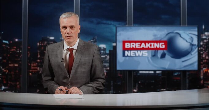 Professional Mature TV Presenter of National News Marathon Conducts Live Broadcast, Promptly Informing About International Events. Breaking News Screen Creates Atmosphere of Constant Updates.