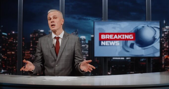 Elegant Male Journalist From Country Main Information Channel Hosts 24 7 News Marathon. Against Breaking News Studio Screen, Man Analyzes Global Processes, Political Changes, and Economic Challenges.