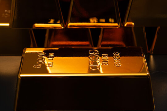 Metal gold texture. Gold reserve bullion bars. Gold and banking concepts. Gold bar in investment.