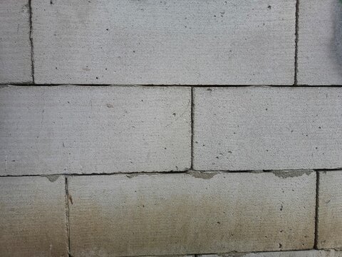 Industrial Lightweight Concrete Block Wall Texture with Grey AAC Masonry and Weathered Porous Surface