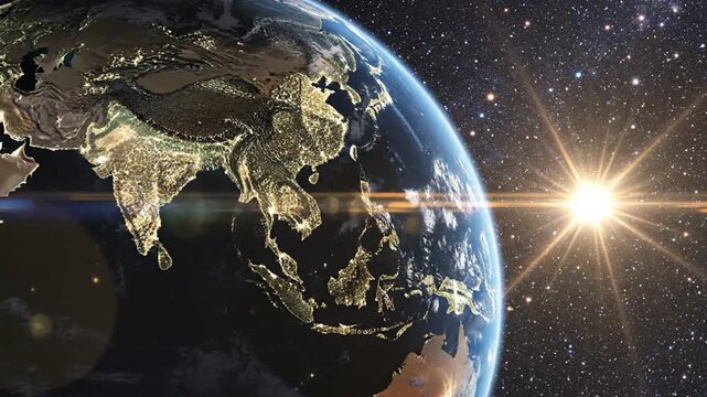 Earth at night with sun glare.