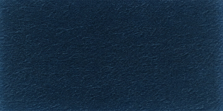 A dark blue denim fabric and rough leather material texture with a macro textile pattern surface for a professional design backdrop
