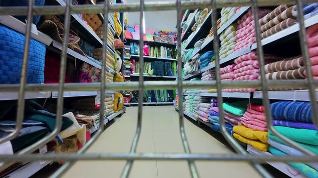 Point of view shopping cart moving through indian store aisle stock video footage.