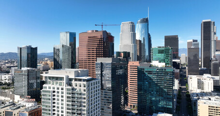 Obraz premium Los Angeles skyline modern skyscrapers cityscape. Los Angeles downtown skyline financial center. Los Angeles urban towers panorama view. Los Angeles aerial drone skyline.